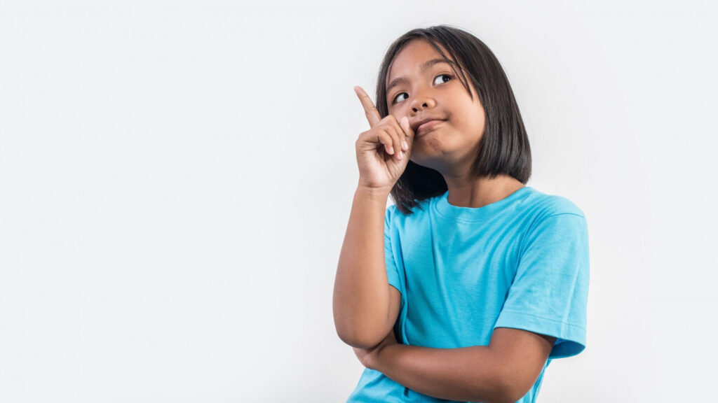 Child pointing above, an activity many child lots enjoy in their playful exploration